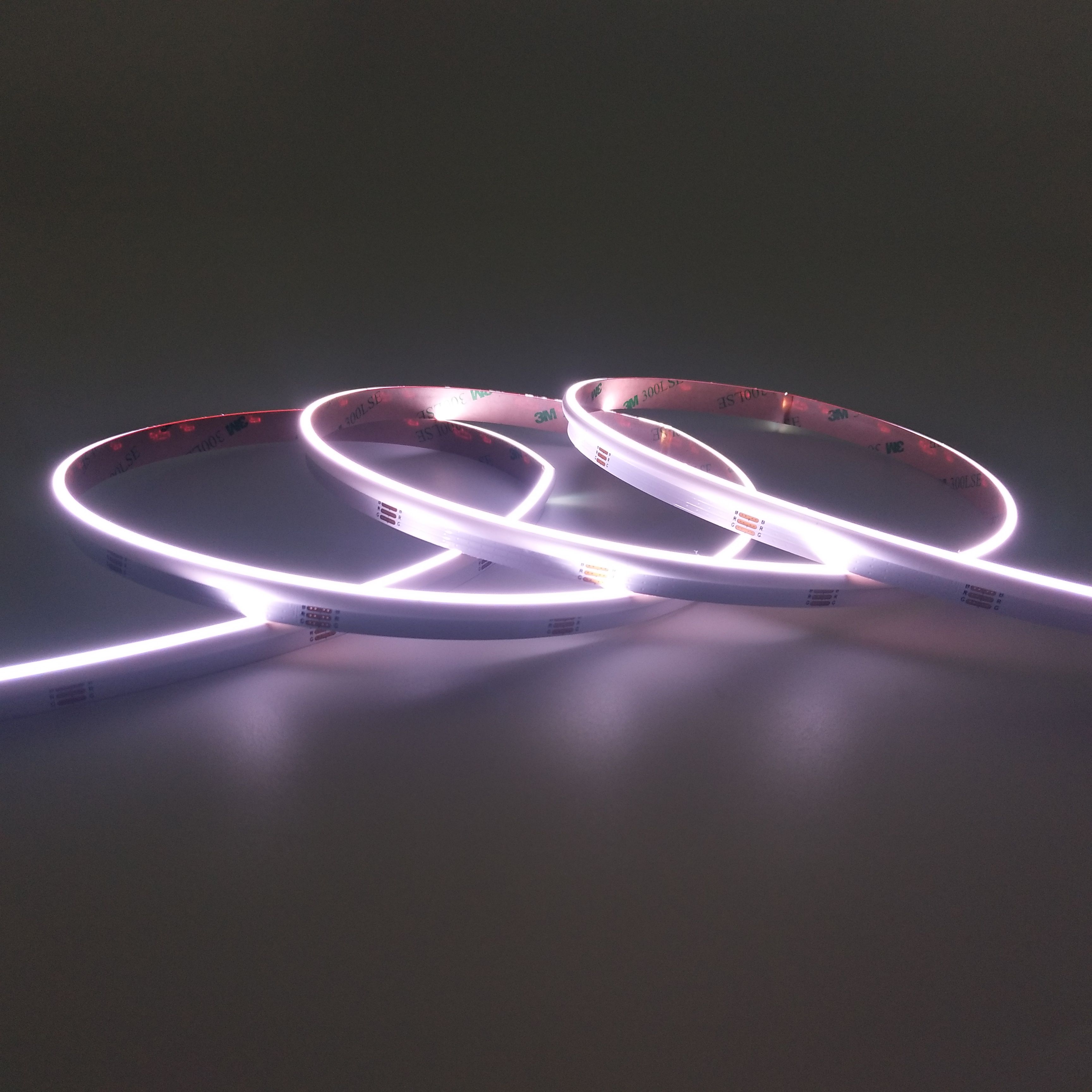 RGB side-emitting COB LED strip displaying a mixed white light effect